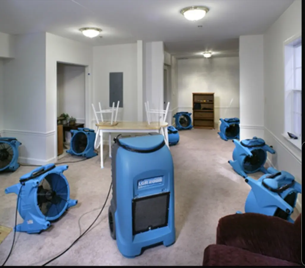 Air movers and dehumidifier setup for Water Damage Restoration in North Elba